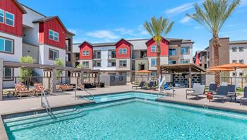 our apartments offer a swimming pool with a variety of chairs and umbrellasat Weylyn Luxury Apartments, Arizona